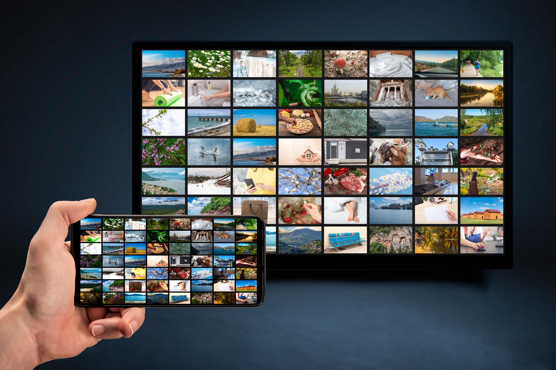 man holding mobile phone with many icons of video service on demand on background Online TV VOD provider. Interface video distribution service. Subscription service. Streaming video.